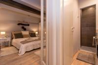 Posteľ alebo postele v izbe v ubytovaní Heraclea Residential Apartments