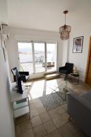 Televízia a/alebo spoločenská miestnosť v ubytovaní Letmalaga Malasaña City Views Superior Apartment
