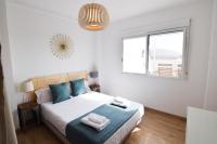 Posteľ alebo postele v izbe v ubytovaní Letmalaga Malasaña City Views Superior Apartment