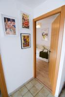 Posteľ alebo postele v izbe v ubytovaní Letmalaga Malasaña City Views Superior Apartment