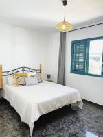 Postel nebo postele na pokoji v ubytování Casa Yaya