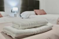 Posteľ alebo postele v izbe v ubytovaní Apartamento de 3 dorm en pleno centro de Nerja