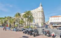 a group of motorcycles parked on a city street at 1 Bedroom Awesome Apartment In Le Cannet in Le Cannet