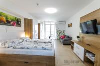 Posteľ alebo postele v izbe v ubytovaní Tisza Gyöngye Apartmanok