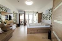 Posteľ alebo postele v izbe v ubytovaní Tisza Gyöngye Apartmanok