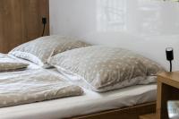 Posteľ alebo postele v izbe v ubytovaní Tisza Gyöngye Apartmanok