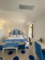 Hotel Il Gabbianoにあるベッド