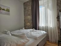 Posteľ alebo postele v izbe v ubytovaní Heritage Stone Wall