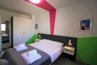 Cama o camas de una habitación en CASATURIS NEWON APARTAMENTOS en EL CAMPELLO