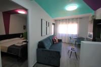 Cama o camas de una habitación en CASATURIS NEWON APARTAMENTOS en EL CAMPELLO