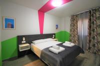 Cama o camas de una habitación en CASATURIS NEWON APARTAMENTOS en EL CAMPELLO