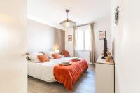 Łóżko lub łóżka w pokoju w obiekcie Superbe appartement avec terrasse sur les toits