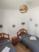 Postel nebo postele na pokoji v ubytování Vakantiewoning CasaLucka4enjoy private pool and mountain view regio Calpe-Jalon