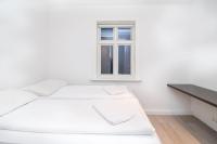 Postel nebo postele na pokoji v ubytování City Point Reykjavik - Luxury Apartments - Surtsey