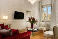 Televízia a/alebo spoločenská miestnosť v ubytovaní San Firenze Suites & Spa