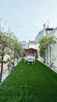 Vonkajšia záhrada v ubytovaní Charmante Maison centre deauville