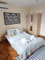 Postel nebo postele na pokoji v ubytování Apartment Zdravets, in the heart of the old city