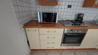 A kitchen or kitchenette at Appartamento Alessandro