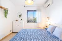 Posteľ alebo postele v izbe v ubytovaní 1ºlineaMar-exclusive-BBQ-wifi-Relax-PortAventura6