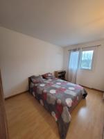 Łóżko lub łóżka w pokoju w obiekcie Le Peupleraie chez l'habitant