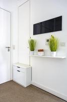 a white room with plants on a wall at Apt 6P - Standing RER Tram Paris Orly Velizy in Le Plessis-Robinson