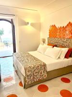 Hotel Il Gabbianoにあるベッド