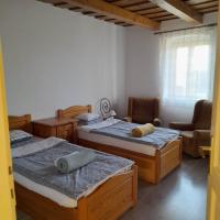 Posteľ alebo postele v izbe v ubytovaní Recece vendégház