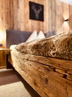 Posteľ alebo postele v izbe v ubytovaní Sonn-Alm Chalet-Apartments