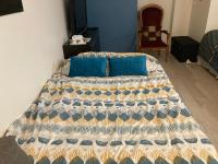 Posteľ alebo postele v izbe v ubytovaní Une chambre chez nous, à 12 minutes de Paris