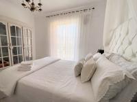 A bed or beds in a room at Casa Villamena