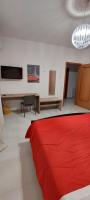 Televízia a/alebo spoločenská miestnosť v ubytovaní B&b del corso