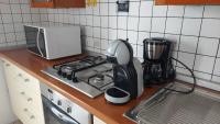 A kitchen or kitchenette at Appartamento Alessandro