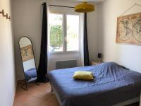 Łóżko lub łóżka w pokoju w obiekcie Gîte « les rives de l’Ardèche »