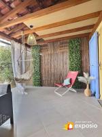 Patio lub wspólna przestrzeń na świeżym powietrzu w obiekcie MARINA SUR L'ILE DES PECHEURS AVEC COMPLEXE AQUATIQUE