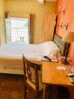 Posteľ alebo postele v izbe v ubytovaní Hotel de la Sologne