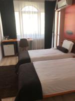 Postel nebo postele na pokoji v ubytování Hotel GabriSa