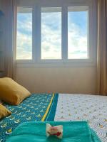 Posteľ alebo postele v izbe v ubytovaní Chambre privée dans un appartement partagé