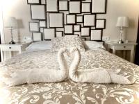 Posteľ alebo postele v izbe v ubytovaní APARTAMENTO SAN NICOLAS