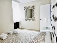 Posteľ alebo postele v izbe v ubytovaní APARTAMENTO SAN NICOLAS