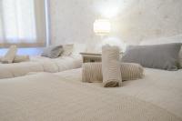 Cama ou camas em um quarto em Manoir 4 &eacute;toiles - 2 chambres, proche lac
