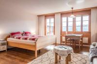 Postel nebo postele na pokoji v ubytování Studio Burgfeld - GRIWA RENT AG