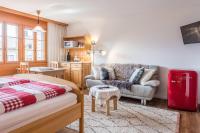 Postel nebo postele na pokoji v ubytování Studio Burgfeld - GRIWA RENT AG