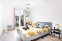 Posteľ alebo postele v izbe v ubytovaní Bright flat near Disneyland with private parking