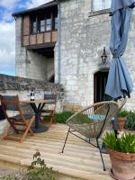 Patio alebo iná vonkajšia časť ubytovania Le Lodge de Richard, studio indépendant