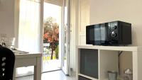 Telewizja i/lub zestaw kina domowego w obiekcie Elisabeth House
