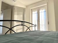 Łóżko lub łóżka w pokoju w obiekcie Elisabeth House