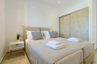 Postel nebo postele na pokoji v ubytování IL SOGNO VILLAS Paros