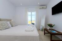 Postel nebo postele na pokoji v ubytování IL SOGNO VILLAS Paros