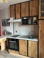 Kuchnia lub aneks kuchenny w obiekcie Appartement avec piscine - rez de jardin