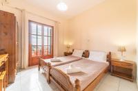 Posteľ alebo postele v izbe v ubytovaní Arianna apartment 11